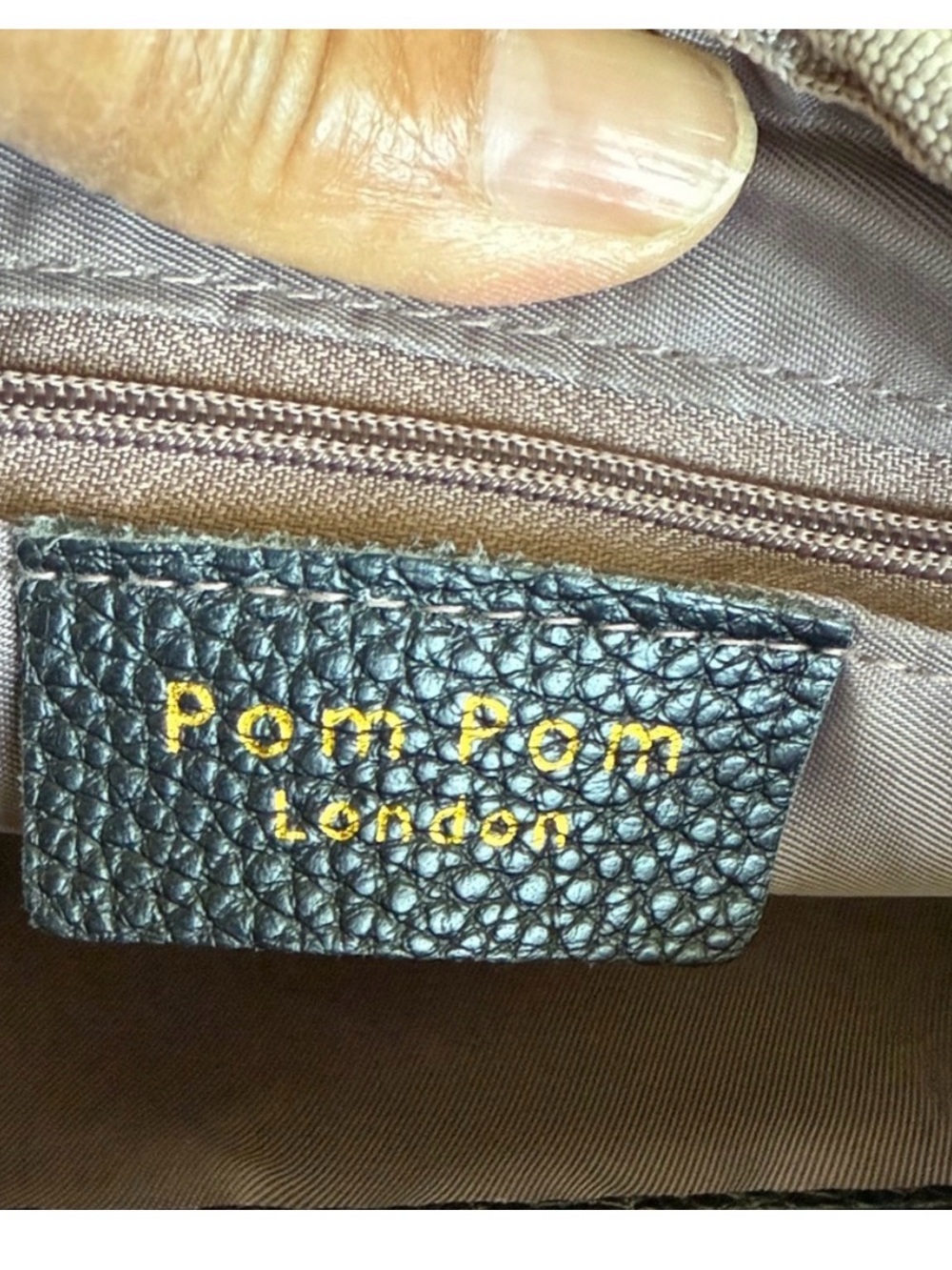 Compact Black Pebble Crossbody with Patterned Strap - Picture 11 of 12